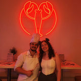 Neon Logo personalisiert in Orange – Tanzschule Krebs Eingangsbereich BeMyNeon